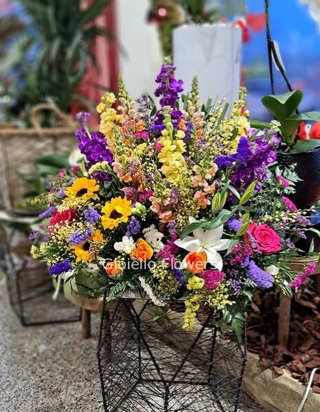 Cuscino funebre fiori misti tonalità bianco